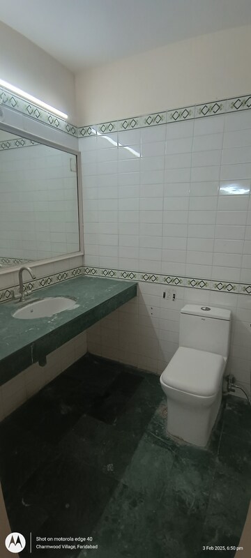 Bathroom in 2 BHK Apartment at Eros Southend Apartments, Charmwood Village – for Rent