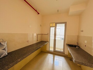 Kitchen in 2 BHK Apartment at Piramal Vaikunth, Balkum Pada – for Rent