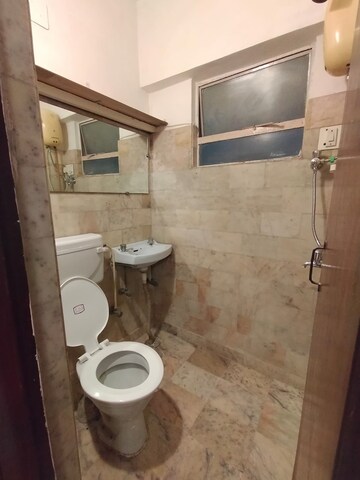Bathroom in 1 RK Apartment at Defence Colony – for Rent