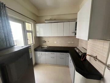 Kitchen in 2.5 BHK Apartment at JKG Palm Resort, Raj Nagar Extension – for Rent