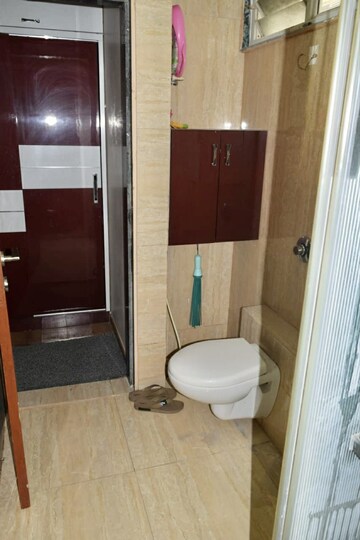 Bathroom in 3 BHK Apartment at Shree Balaji Wind Park, Near Nirma University On Sg Highway – for Rent