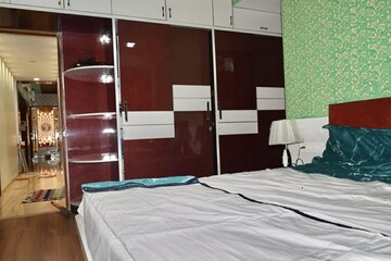 Bedroom in 3 BHK Apartment at Shree Balaji Wind Park, Near Nirma University On Sg Highway – for Rent