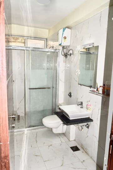 Bathroom in 3 BHK Apartment at Shree Balaji Wind Park, Near Nirma University On Sg Highway – for Rent