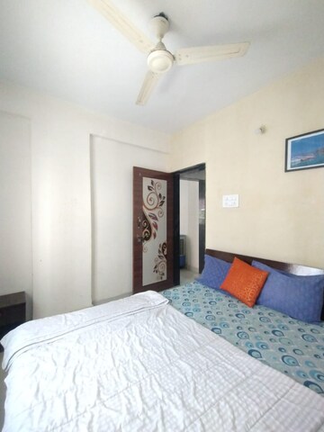 Bedroom in 2 BHK Apartment at Ganga Arcadia, Kharadi – for Rent