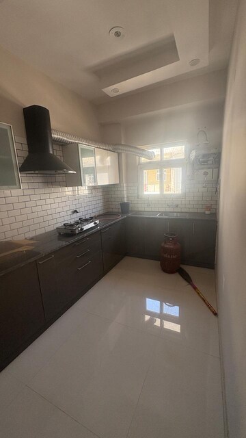 Kitchen in 2 BHK Apartment at Lake View Complex, Dhakoli Village – for Rent