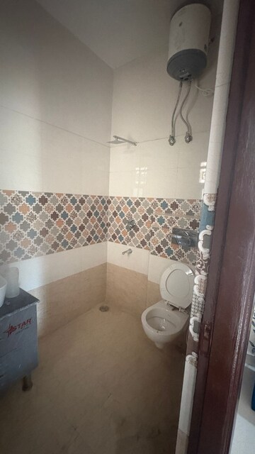 Bathroom in 2 BHK Apartment at Lake View Complex, Dhakoli Village – for Rent