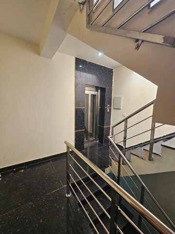 Staircase in 2 BHK Apartment at Raheja Vedas, Sector 108 – for Rent