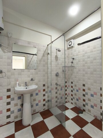 Bathroom in 3 BHK Apartment at Rajapushpa Provincia, Narsingi – for Rent