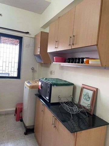 Kitchen in 2 BHK Apartment at Harbour Court, Sector 19a – for Sale