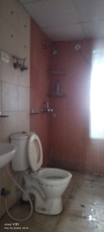 Bathroom in 3 BHK Apartment at Sector 16c Greater Noida – for Rent