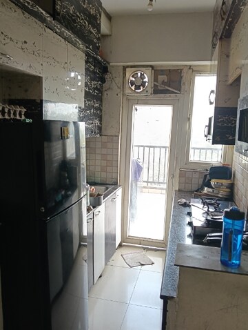 Kitchen in 2 BHK Apartment at La Residentia, Tech Zone 4 Greater Noida – for Rent