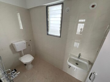 Bathroom in 2 BHK Apartment at Shapoorji Pallonji Vanaha Golfland, Bavdhan – for Rent