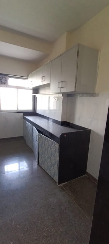 Kitchen in 3 BHK Apartment at Kalpataru Hills, Manpada – for Rent