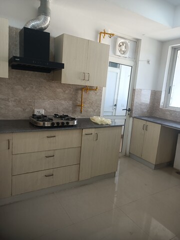 Kitchen in 2 BHK Apartment at Jaypee Greens Kalypso Court, Sector 128 – for Rent