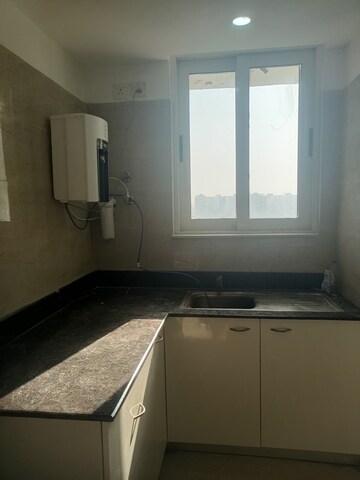 Kitchen in 2 BHK Apartment at Jaypee Greens Kalypso Court, Sector 128 – for Rent