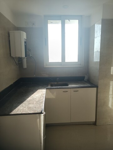 Kitchen in 2 BHK Apartment at Jaypee Greens Kalypso Court, Sector 128 – for Rent