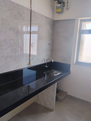 Kitchen in 2 BHK Apartment at Sheth Irene, Malad West – for Rent