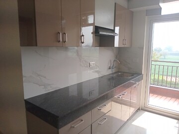 Kitchen in 2 BHK Apartment at Suncity Avenue 76, Sector 76 – for Rent
