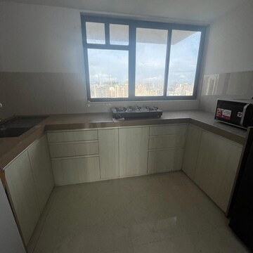 Kitchen in 2 BHK Apartment at Kanakia Hollywood, Yari Road – for Rent