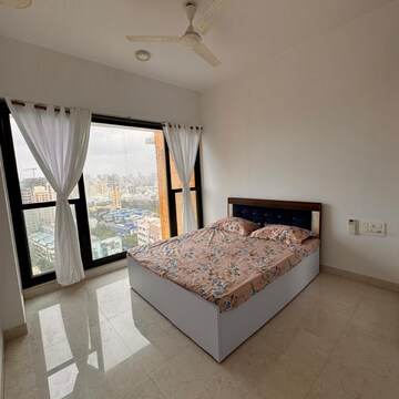 Bedroom in 2 BHK Apartment at Kanakia Hollywood, Yari Road – for Rent