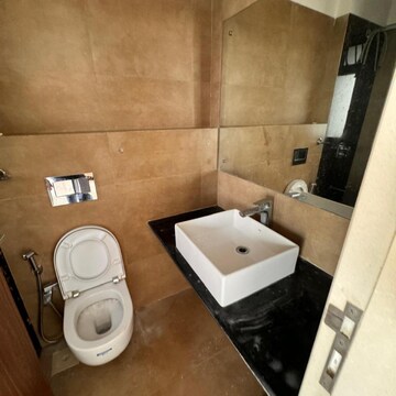Bathroom in 2 BHK Apartment at Kanakia Hollywood, Yari Road – for Rent