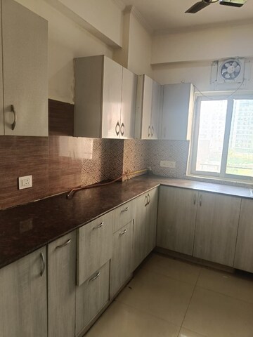 Kitchen in 2 BHK Apartment at Gardenia Gateway, Sector 75 – for Rent