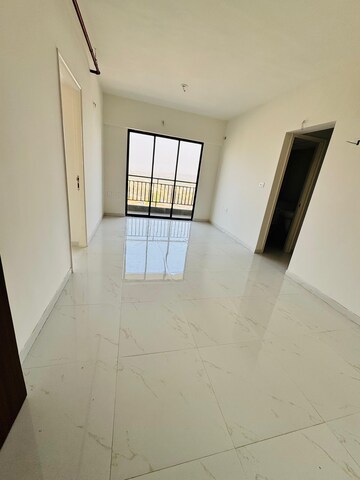 Living Room in 1 BHK Apartment at Runwal Gardens, Dombivli East – for Rent