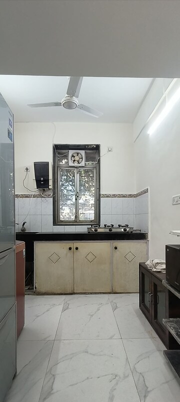 Kitchen in 1 BHK Apartment at Suraj CHS Juhu, Juhu – for Rent