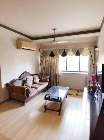 Living Room in 2 BHK Apartment at Purbi CHS, Vasai East – for Sale