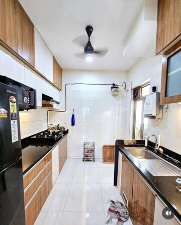 Kitchen in 2 BHK Apartment at Girnar Accord CHS, Nalasopara East – for Sale