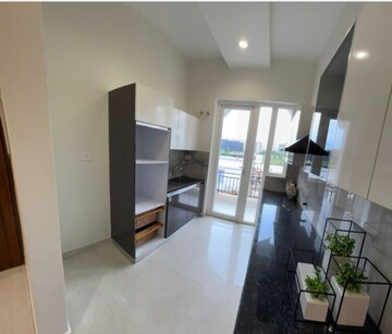 Kitchen in 3 BHK Builder Floor at Dhakoli Village – for Sale
