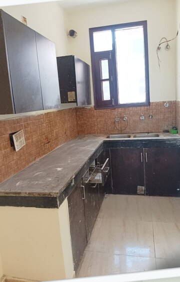 Kitchen in 4 BHK Builder Floor at Dhakoli Village – for Sale
