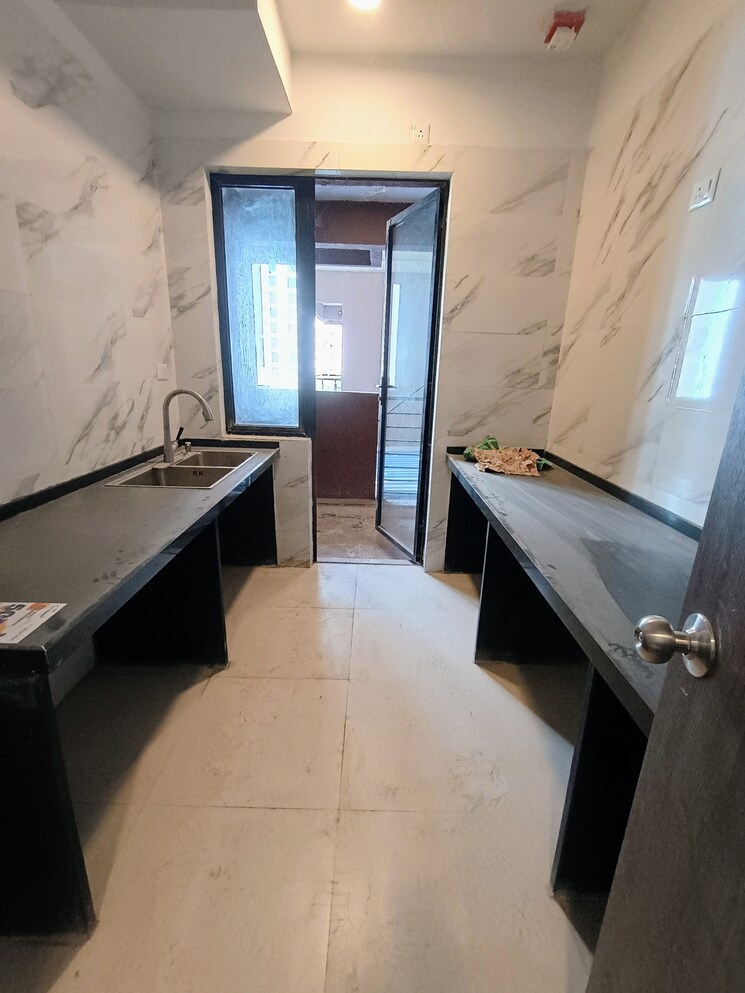 Kitchen, risland-the-icon 2 Bedroom 671 Sq.Ft. Apartment In Dhokali Thane 8208196