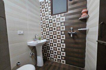 Bathroom in 3 BHK Builder Floor at Dhakoli Village – for Sale