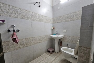Bathroom in 3 BHK Builder Floor at Dhakoli Village – for Sale