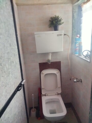 Bathroom in 1 BHK Apartment at Riddhi Siddhi Paradise Tilak Nagar, Tilak Nagar – for Rent