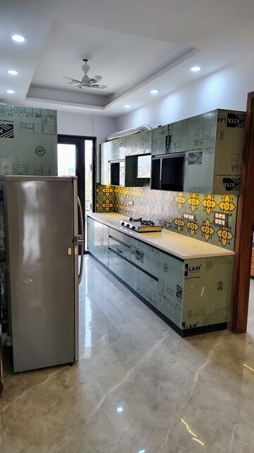 Kitchen in 4 BHK Builder Floor at AEZ Aloha, Sector 57 – for Rent