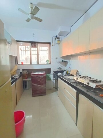 Kitchen in 2 BHK Apartment at Purbi CHS, Vasai East – for Sale