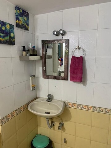 Bathroom in 2 BHK Apartment at Purbi CHS, Vasai East – for Sale