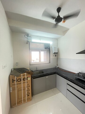 Kitchen in 2 BHK Apartment at Ashar Axis, Majiwada – for Rent