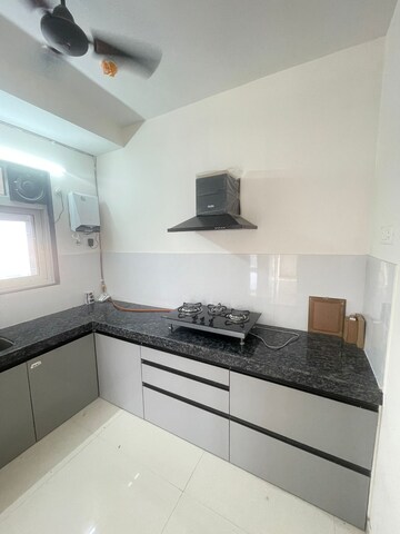 Kitchen in 2 BHK Apartment at Ashar Axis, Majiwada – for Rent