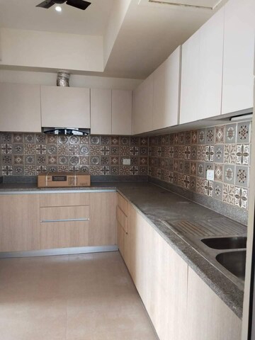 Kitchen in 4 BHK Apartment at ATS Triumph, Sector 104 – for Rent