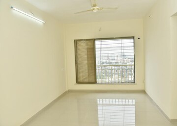 Living Room in 1 BHK Apartment at Unique Aurum, Mira Road – for Sale