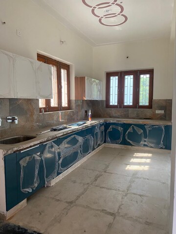 Kitchen in 4 BHK Independent House at Ansal Sushant Golf city, Sushant Golf City – for Rent