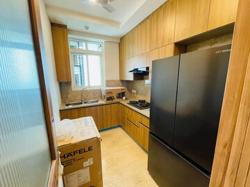 Kitchen in 2 BHK Apartment at Ambience Creacions, Sector 22 – for Rent