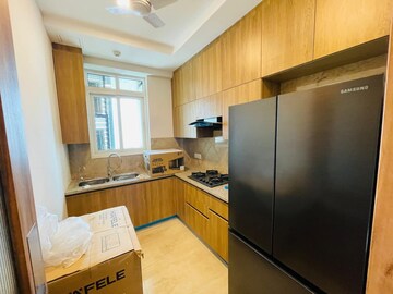 Kitchen in 2 BHK Apartment at Ambience Creacions, Sector 22 – for Rent