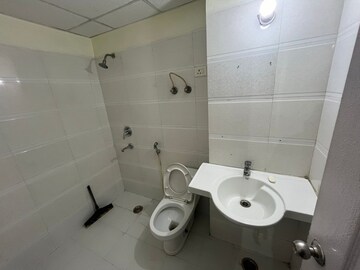 Bathroom in 2 BHK Apartment at JKG Palm Resort, Raj Nagar Extension – for Rent