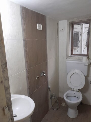 Bathroom in 1 BHK Apartment at Raj Mandir Complex, Mira Road – for Rent