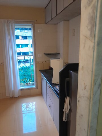 Kitchen in 1 BHK Apartment at Raj Mandir Complex, Mira Road – for Rent