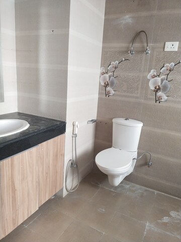 Bathroom in 4 BHK Apartment at Bhawna Apartment, Sector 43 – for Sale
